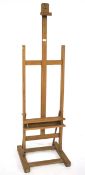 A beech floor standing adjustable artist's easel. Stamped M.a.b.e.f., made in Italy, approx.