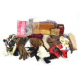 An assortment of scarves and leather gloves.