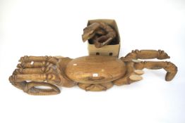 A Samuel Wanjau large wooden sculpture of a crab.