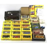 Assorted boxed diecast cars.