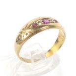 An 18ct gold ruby and diamond ring.