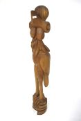 A Samuel Wanjau large carved wooden statue.