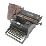 A WWII Imperial 'War Finish' typewriter with outer cover.