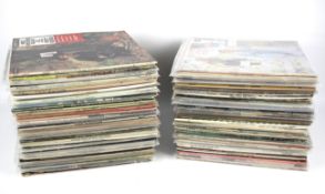 A large collection of vinyl records.