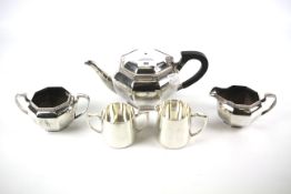 A Mappin and Webb silver plated tea set and two other examples.