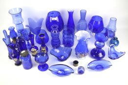 An extensive collection of contemporary Bristol Blue glassware.