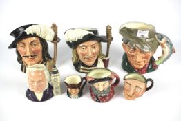 Seven Royal Doulton Toby jugs. Including 'Athos', 'Teh Poacher', 'Aramis', 'Falstaff', etc.