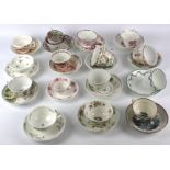 An assortment of 19th century English pottery and porcelain teabowls and saucers.