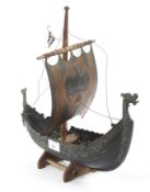 A Tron Art, Copenhagen metal model of a Viking long boat.