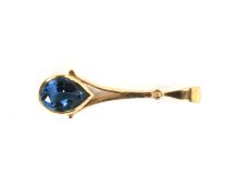 A 9ct gold and 'London Blue' topaz pendant. In teardrop design, L3cm, 2.