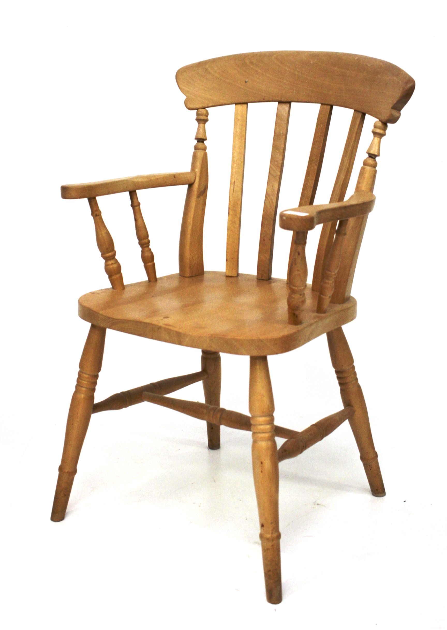 A pine carver chair.