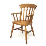 A pine carver chair.