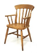 A pine carver chair.