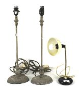 A pair of contemporary weathered metal table lamps and another.