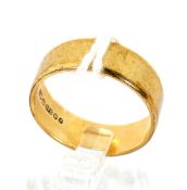 A gentleman's 9ct gold band ring. With London assay marks, ring size S, 4.