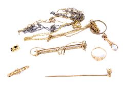 An assortment of yellow metal and scrap gold.