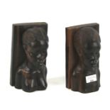 A pair of 20th century carved tribal bookends.