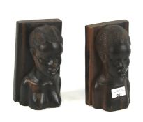 A pair of 20th century carved tribal bookends.
