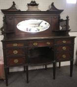 A contemporary mahogany sideboard.