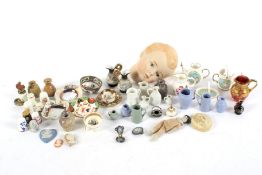 An assortment of miscellaneous miniature ceramics.