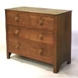A 20th century wooden chest of two short over two long drawers.