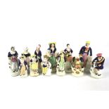 A collection of Staffordshire figures.