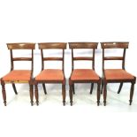A set of four 19th century dining chairs.