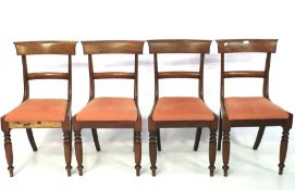 A set of four 19th century dining chairs.