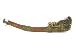 A Tibetan brass and copper horn.
