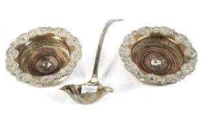 Two decorative silver plated wine coasters and an EPNS ladle.