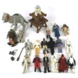 A collection of 1970s and 1980s Starwars toys.