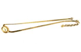 A Christian Dior gilt necklace.