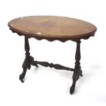A Victorian walnut centre table.