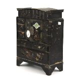 A late 19th/early 20th century Japanese lacquered table top cabinet.