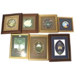 An assortment of seven framed and glazed prints.