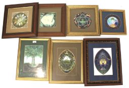 An assortment of seven framed and glazed prints.