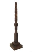 An early 20th century carved wooden column.