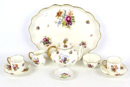 A Doulton Burslem tea set for two.