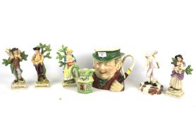Seven ceramic figures.