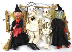 Four 1960s Pelham Puppets.