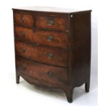 A Victorian flamed mahogany bow front chest of drawers.