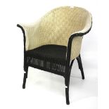 A Lloyd loom chair.