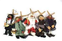 Five Grove International Artist string puppets.