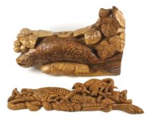 A contemporary carved wooden sculpture.