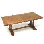 A large 20th century oak coffee table with burrwood veneer.