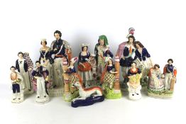 A collection of 19th and 20th century Staffordshire figures.