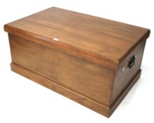 A large pine blanket box. Plank top with a hinged lid, mounted on a plinth base, L110cm x D68.