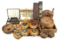 An assortment of wood, plaques and treen.