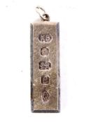 A contemporary silver ingot pendant. L4.5cm, 30.