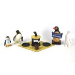An assortment of penguin figures and novelties.